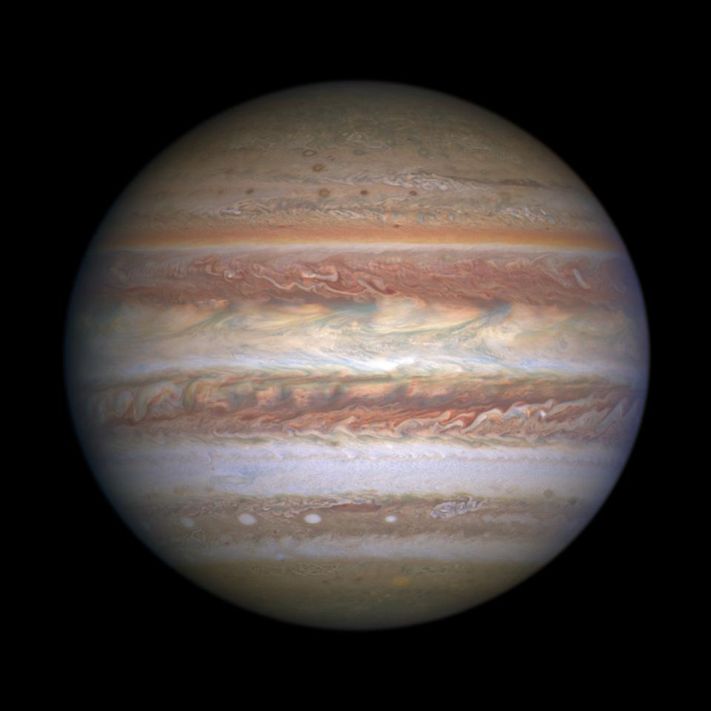 Jupiter glows like a jack-o'-lantern in stunning new images